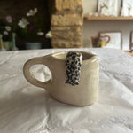 Black Speckled Escaping Slug Mug